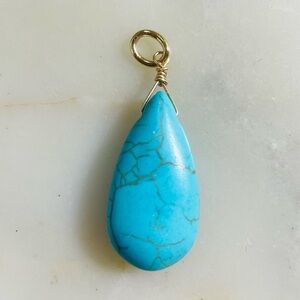 Turquoise bead teardrop chain.